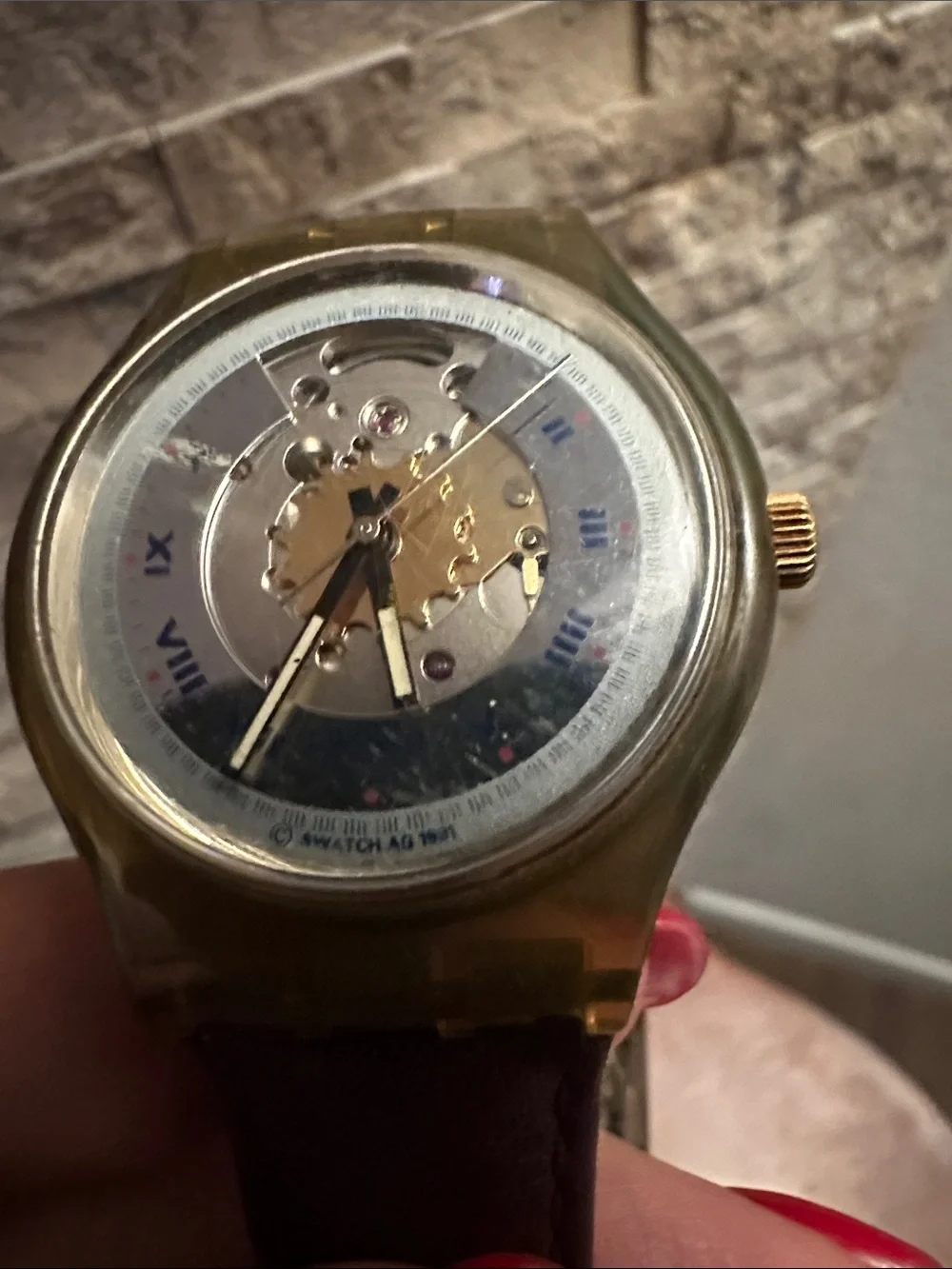 Swatch Gold and Blue Skeleton Dial Watch